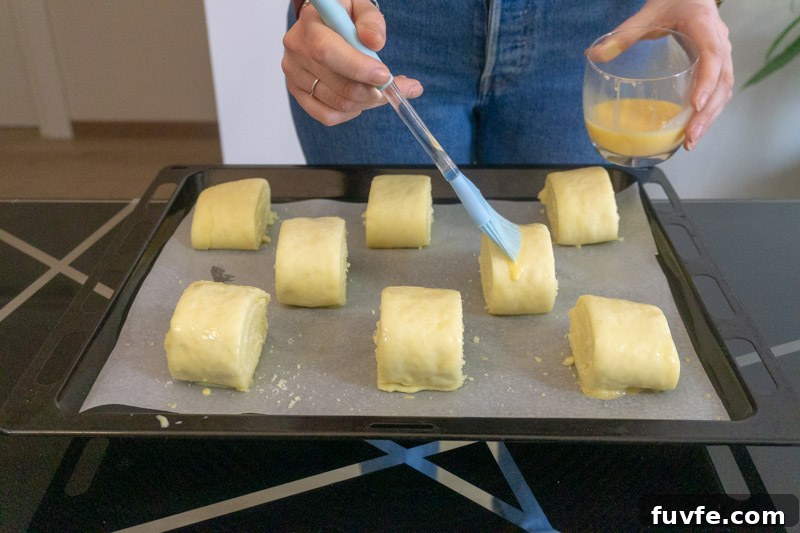 Armenian Gata (Nazook) Recipe: Traditional Sweet Pastry Guide 10 Brushing the gata with egg wash before baking