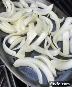 Dwaeji Galbi Korean-Style Pork Ribs Recipe (Ham Ji Park Copycat) 8 Onions under ribs