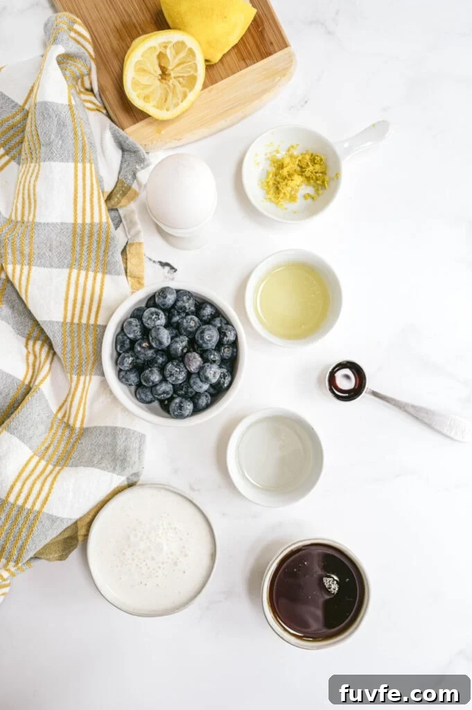 Lemon Blueberry Quick Bread Recipe for Moist Zesty Loaves 3 Ingredients for Lemon Blueberry Bread on a white marble table