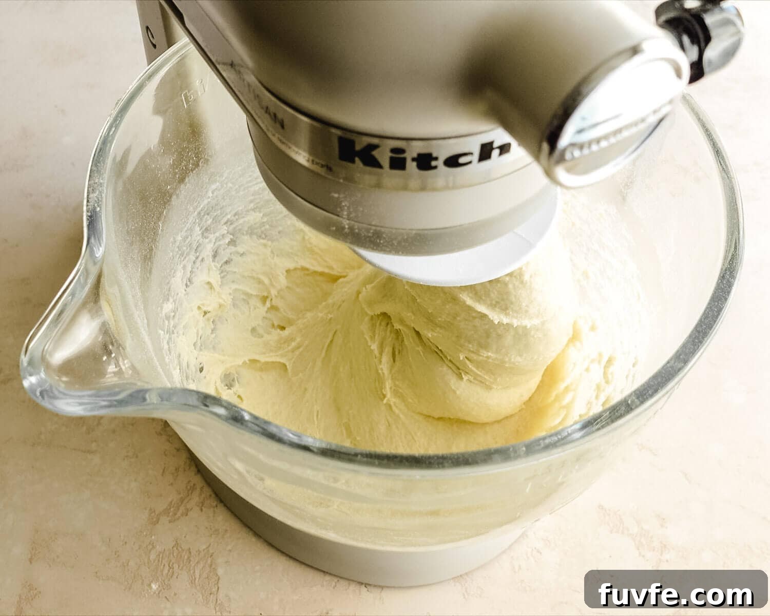 Creamy Condensed Milk Bread Recipe for Soft Homemade Loaf 11 Knead condensed milk bread dough in a stand mixer with the dough hook