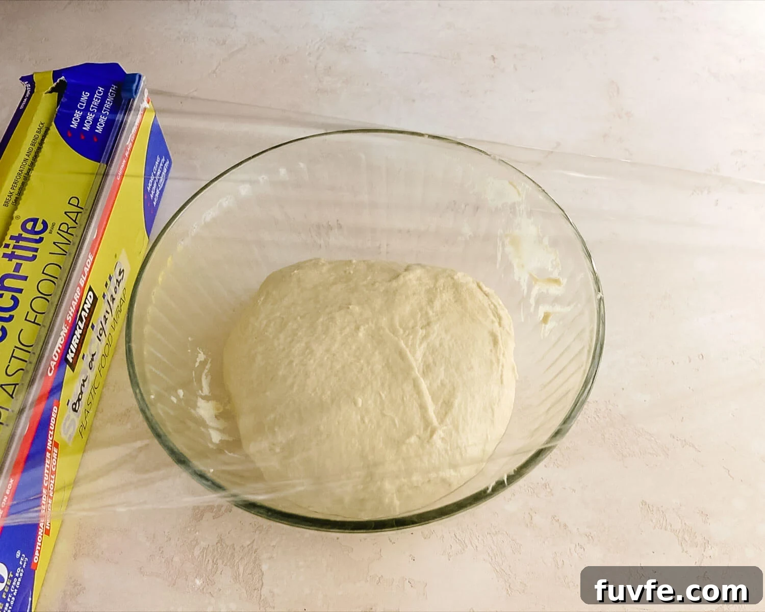 Creamy Condensed Milk Bread Recipe for Soft Homemade Loaf 15 Cover dough with plastic wrap to proof.