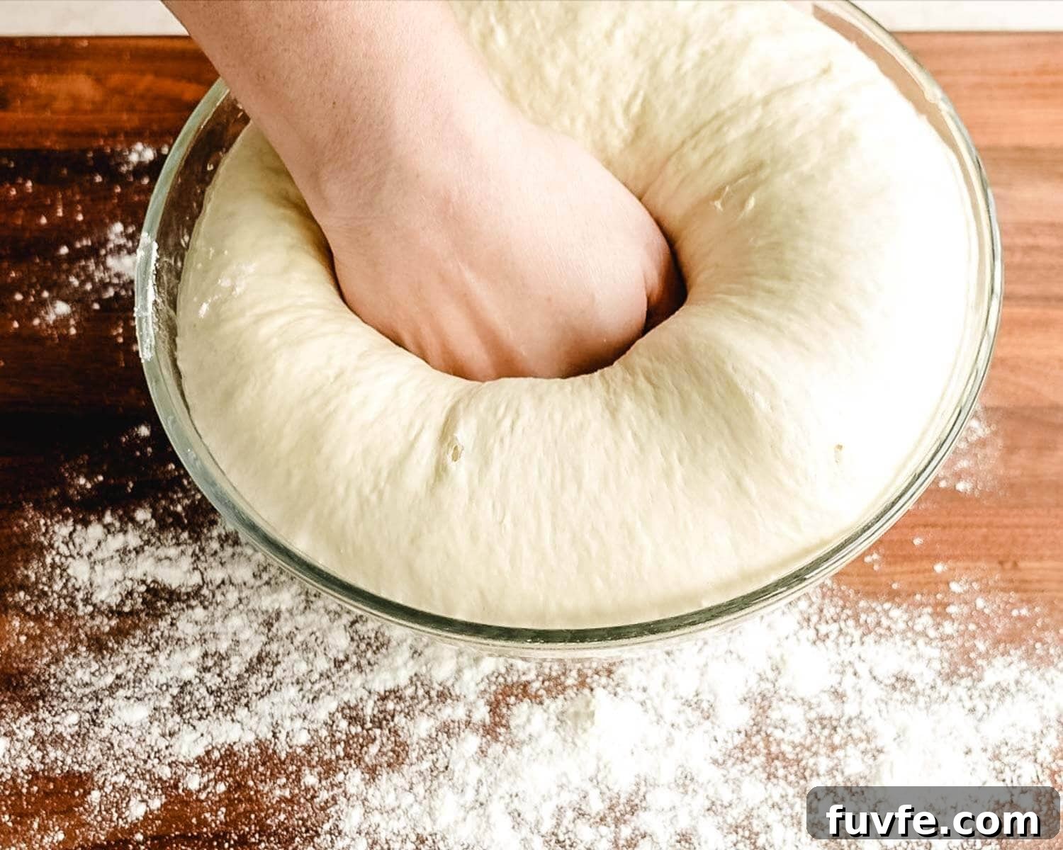 Creamy Condensed Milk Bread Recipe for Soft Homemade Loaf 20 Punch down the dough to remove gas and air.