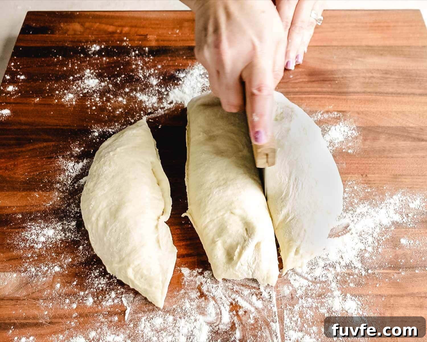 Creamy Condensed Milk Bread Recipe for Soft Homemade Loaf 22 Divide dough into three pieces.