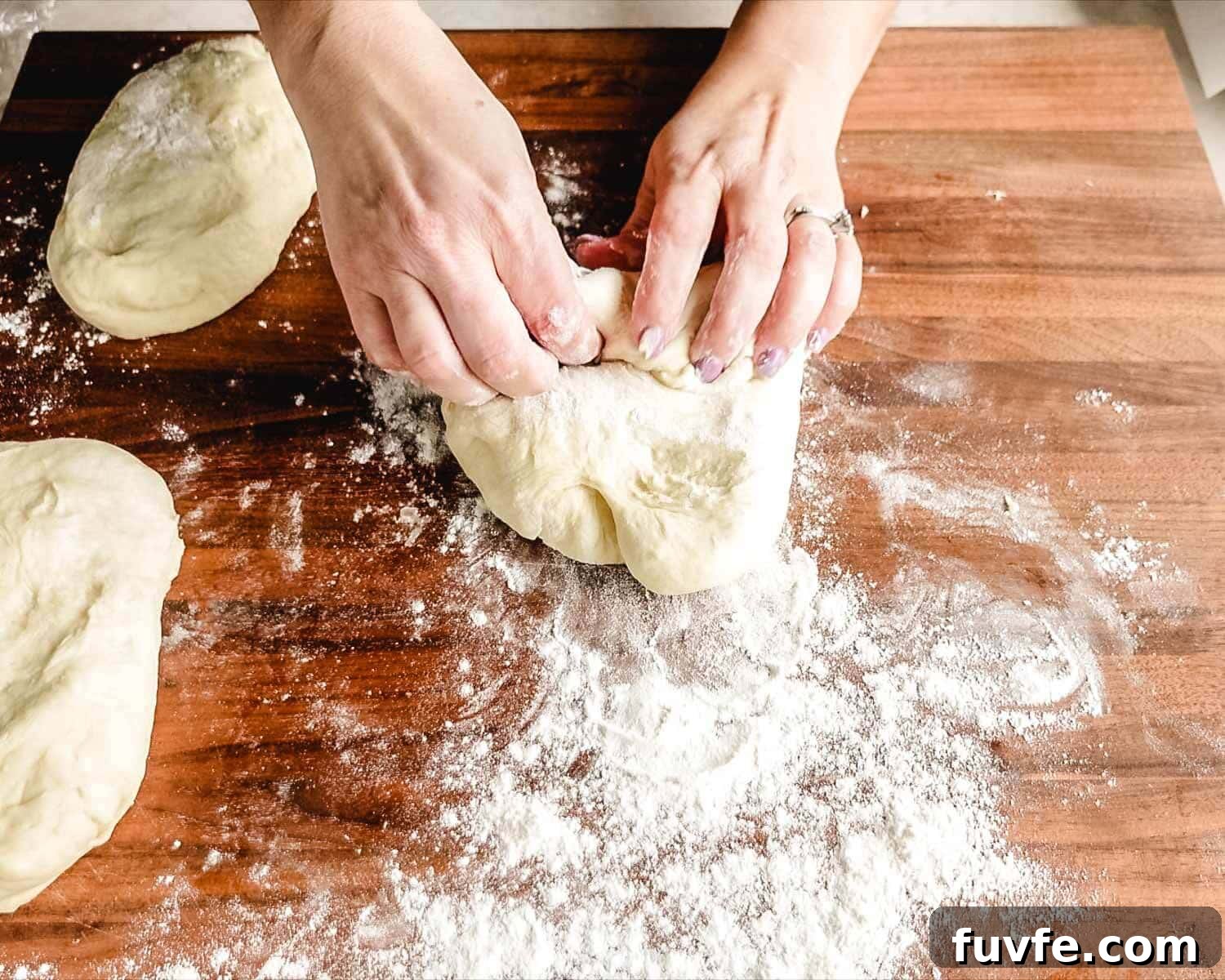 Creamy Condensed Milk Bread Recipe for Soft Homemade Loaf 23 Flatten the dough into a rectangle then roll up.