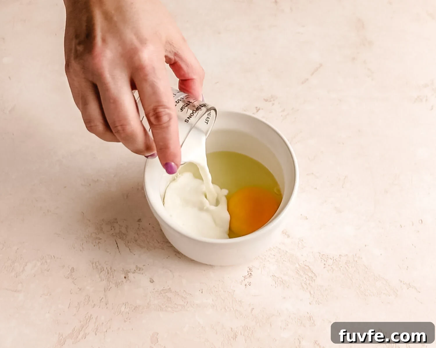 Creamy Condensed Milk Bread Recipe for Soft Homemade Loaf 28 Add milk to egg to make egg wash.
