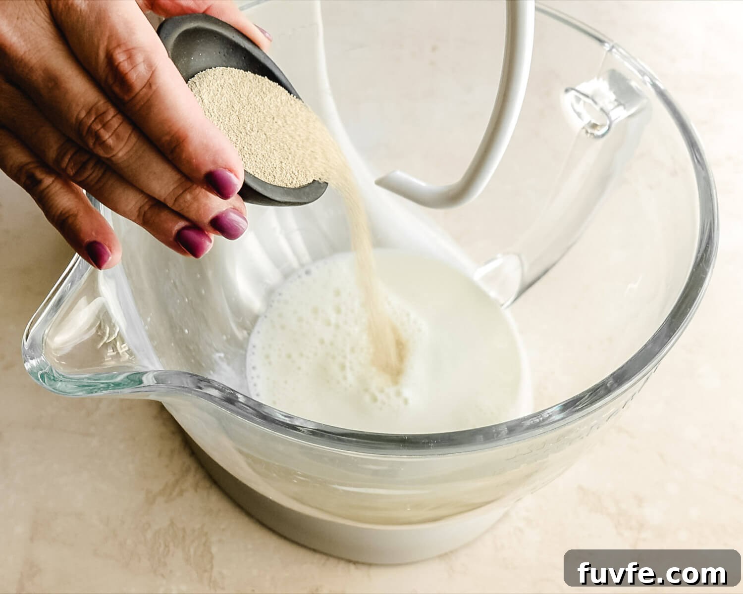 Creamy Condensed Milk Bread Recipe for Soft Homemade Loaf 5 Add yeast to mixing bowl.