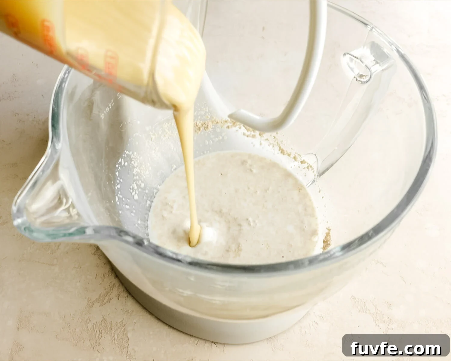 Creamy Condensed Milk Bread Recipe for Soft Homemade Loaf 6 Add condensed milk to mixing bowl.