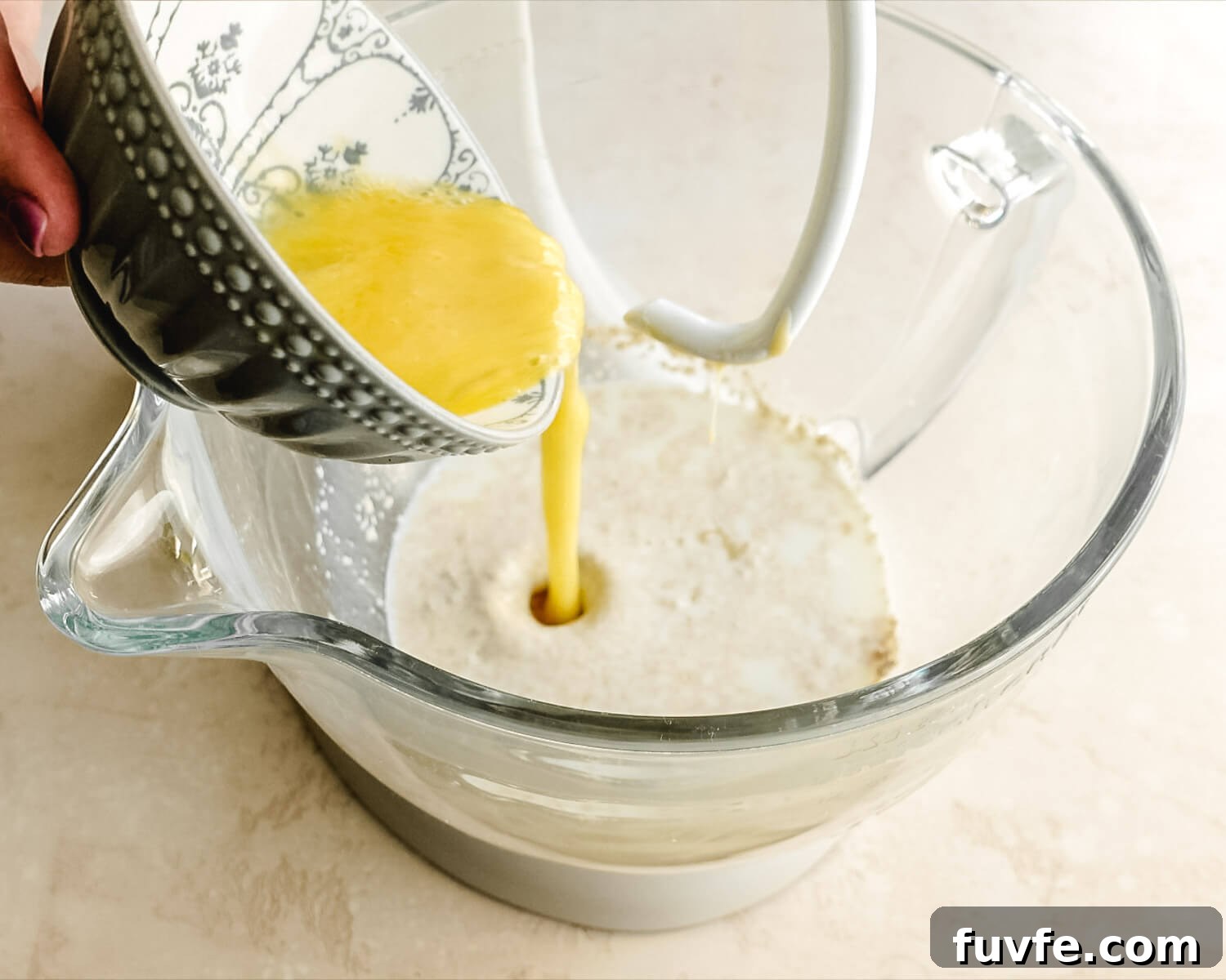 Creamy Condensed Milk Bread Recipe for Soft Homemade Loaf 7 Add beaten egg to mixing bowl.