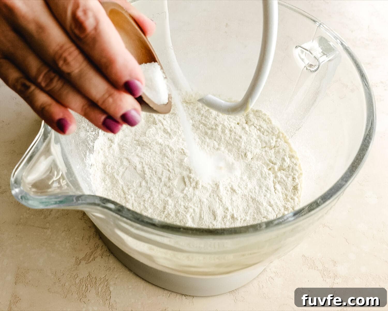 Creamy Condensed Milk Bread Recipe for Soft Homemade Loaf 9 Add salt to mixing bowl.