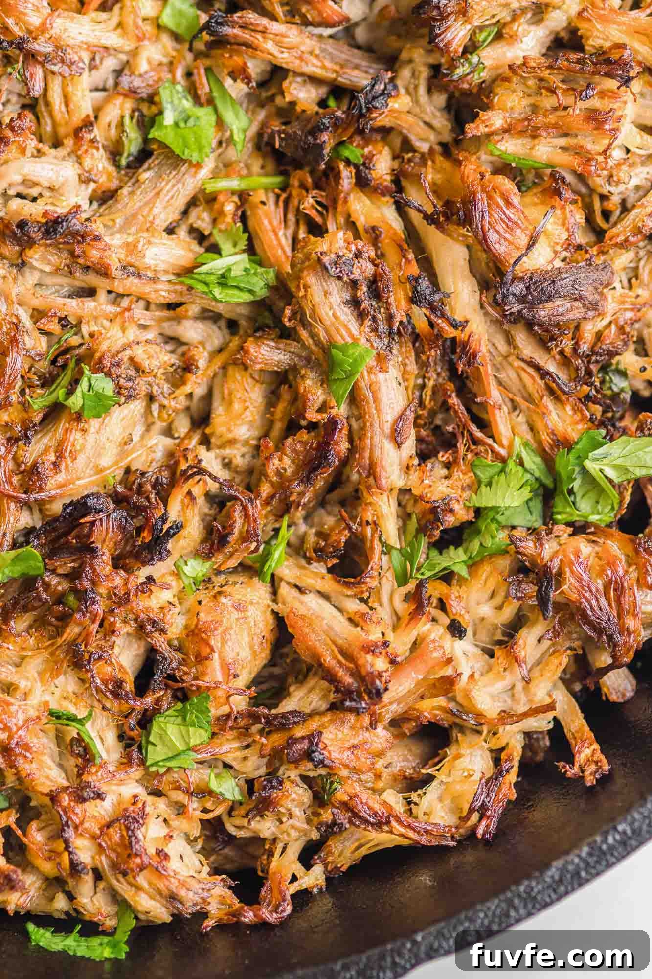 Authentic Instant Pot Carnitas Recipe for Tender Mexican Pork 2 Crispy Instant Pot Carnitas decorated with chopped fresh parsley