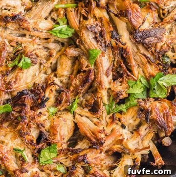 Authentic Instant Pot Carnitas Recipe for Tender Mexican Pork 8 Instant Pot Carnitas crispy in a cast iron dish