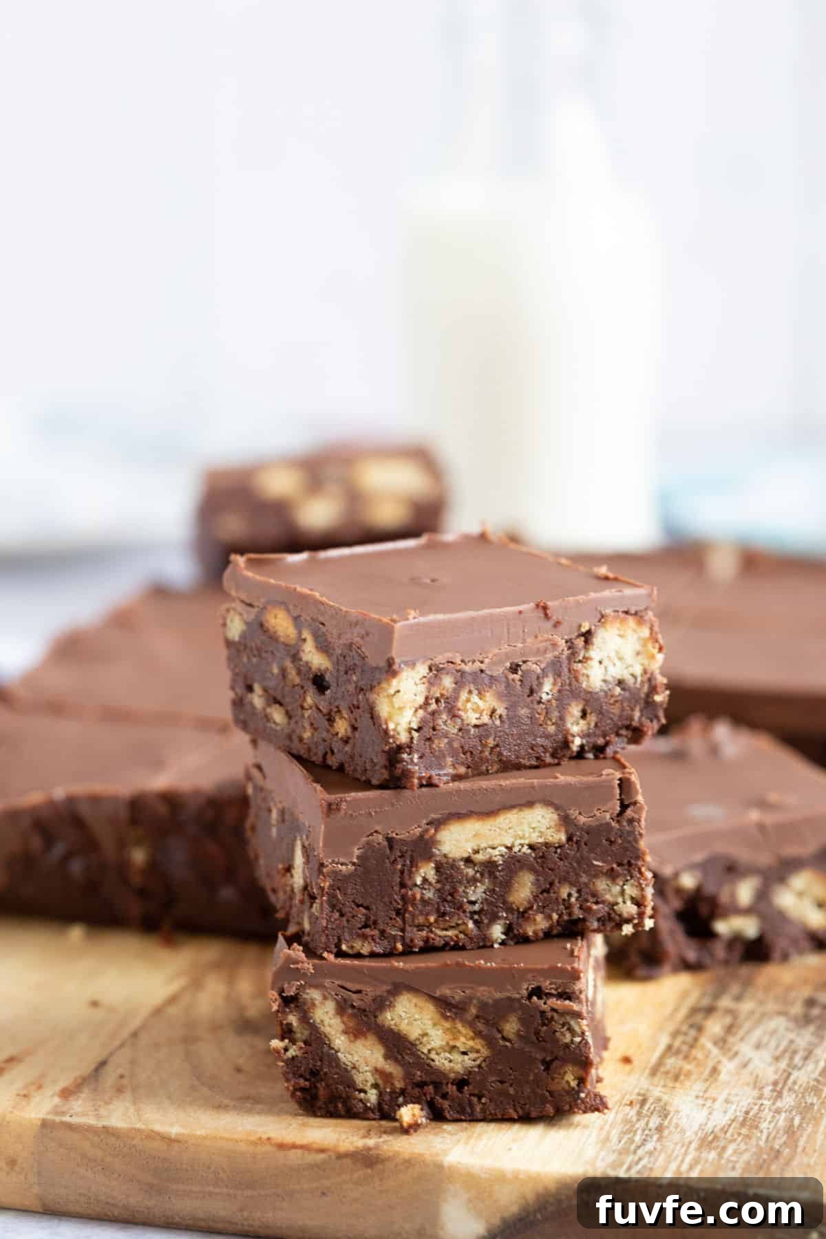 Quick Chocolate Tiffin Recipe: No-Bake Chocolate Biscuit Slice 2 A stack of chocolate tiffin.