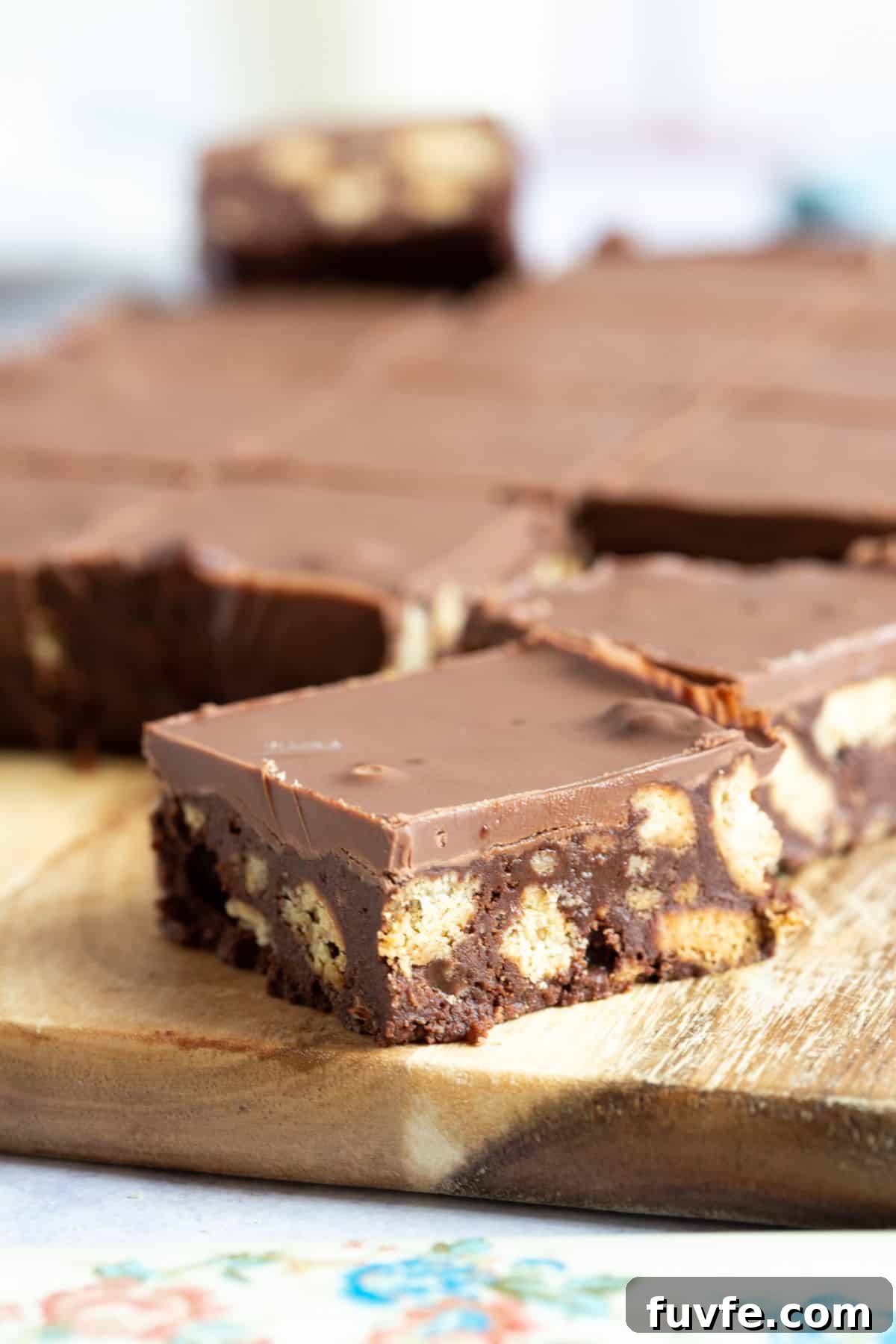 Quick Chocolate Tiffin Recipe: No-Bake Chocolate Biscuit Slice 6 A slice of chocolate tiffin.