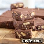 Quick Chocolate Tiffin Recipe: No-Bake Chocolate Biscuit Slice 8 A stack of chocolate tiffin.