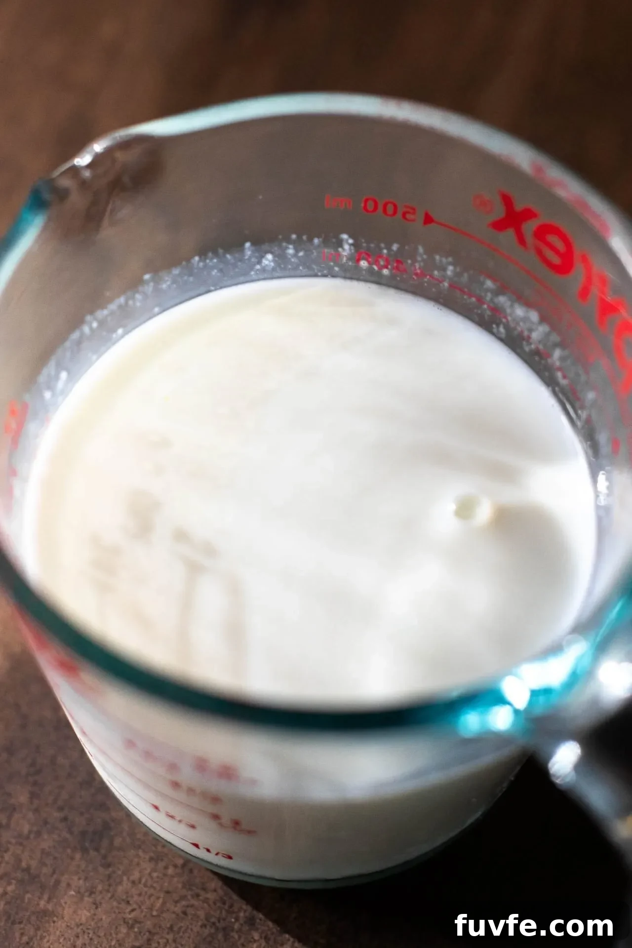 Classic Marble Cake Recipe with Swirled Chocolate-Vanilla Layers 3 marble cake homemade buttermilk in measuring cup