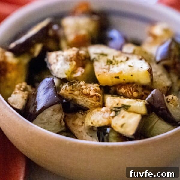 Vegan Antipasti Pasta Salad with Roasted Veggies and Olives 12 A bowl of roasted eggplant with herbs and spices.