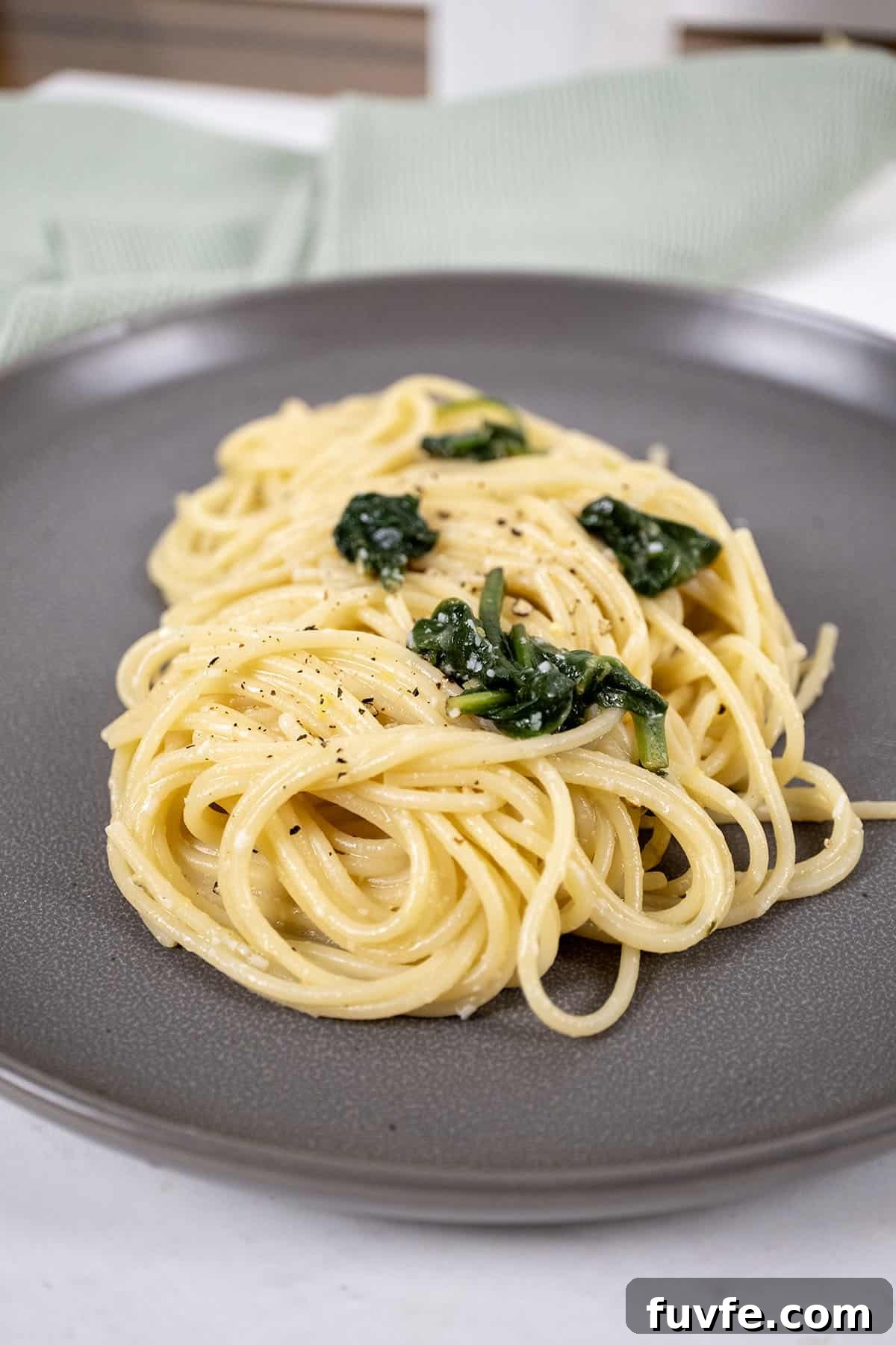Lemon Spinach Pasta Recipe: Bright 20-Minute Weeknight Meal 11 Lemon spinach pasta served on a plate.