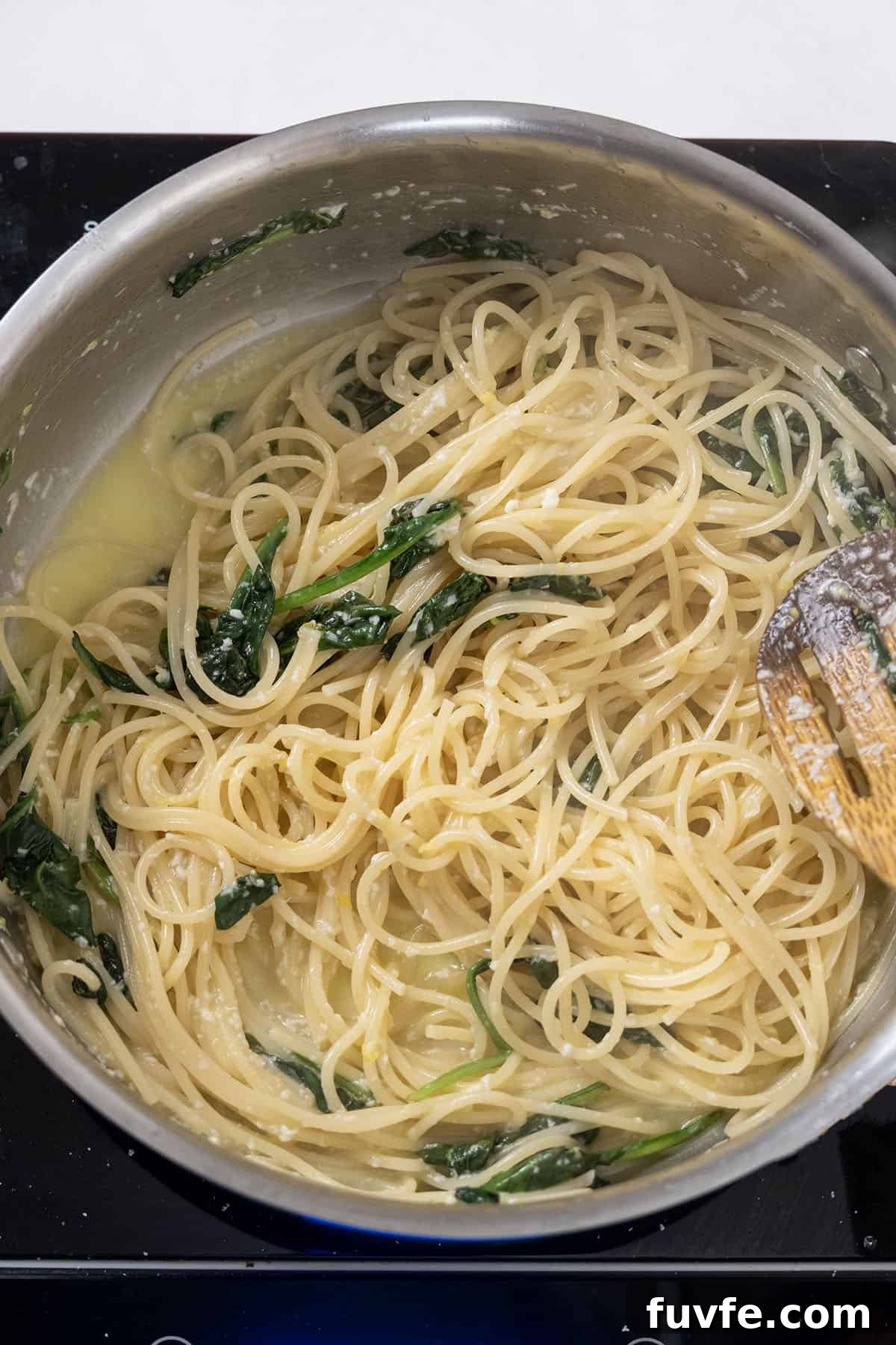 Lemon Spinach Pasta Recipe: Bright 20-Minute Weeknight Meal 10 Pecorino and lemon mixture added to pasta.