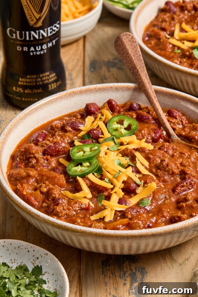 Guinness stout chili with ground beef in a bowl.