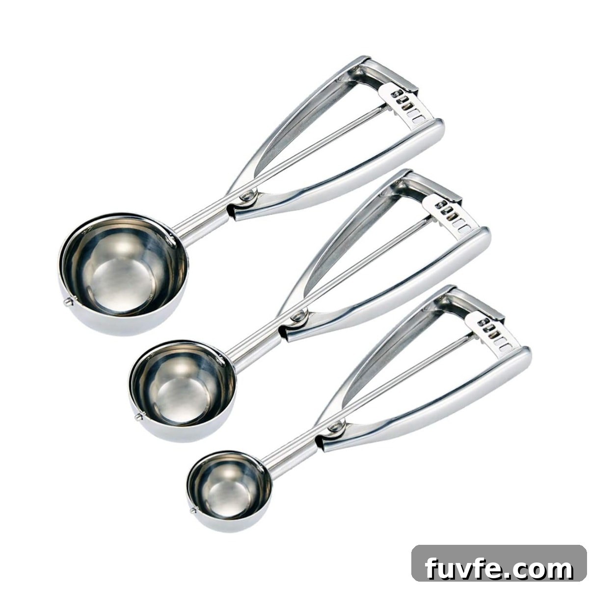 Three different sized cookie scoops.