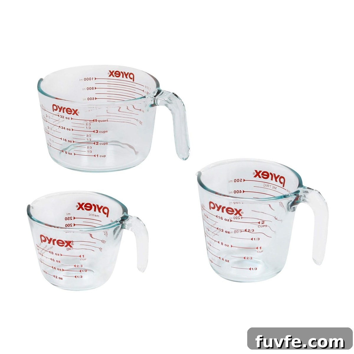 Three glass Pyrex measuring cups.