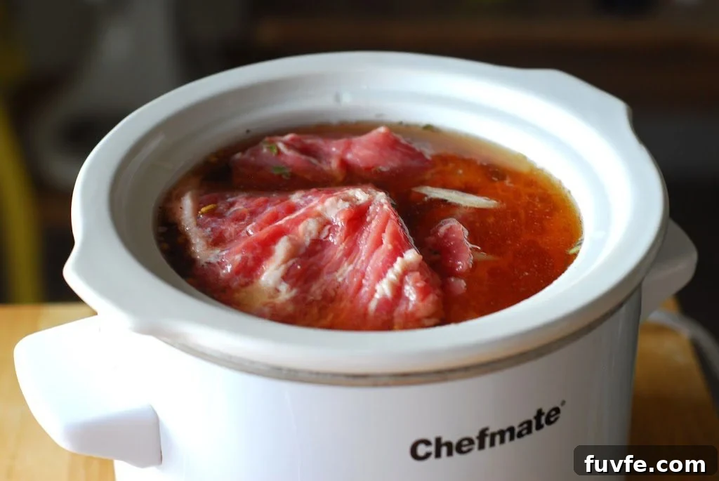 Sous Vide vs Slow Cooker: Which Method Makes Better Meals? 4 Roast in crockpot with liquid.