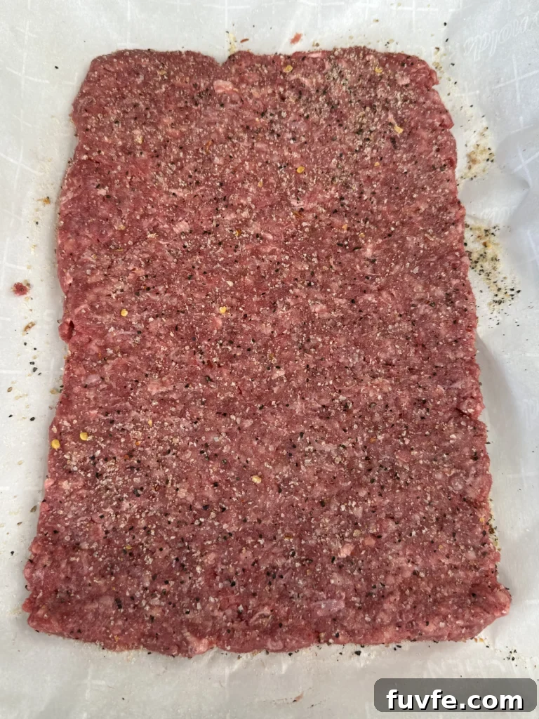 Bacon Jam Cheeseburger Sliders Recipe for Party Appetizers 4 patty mixture on wax paper