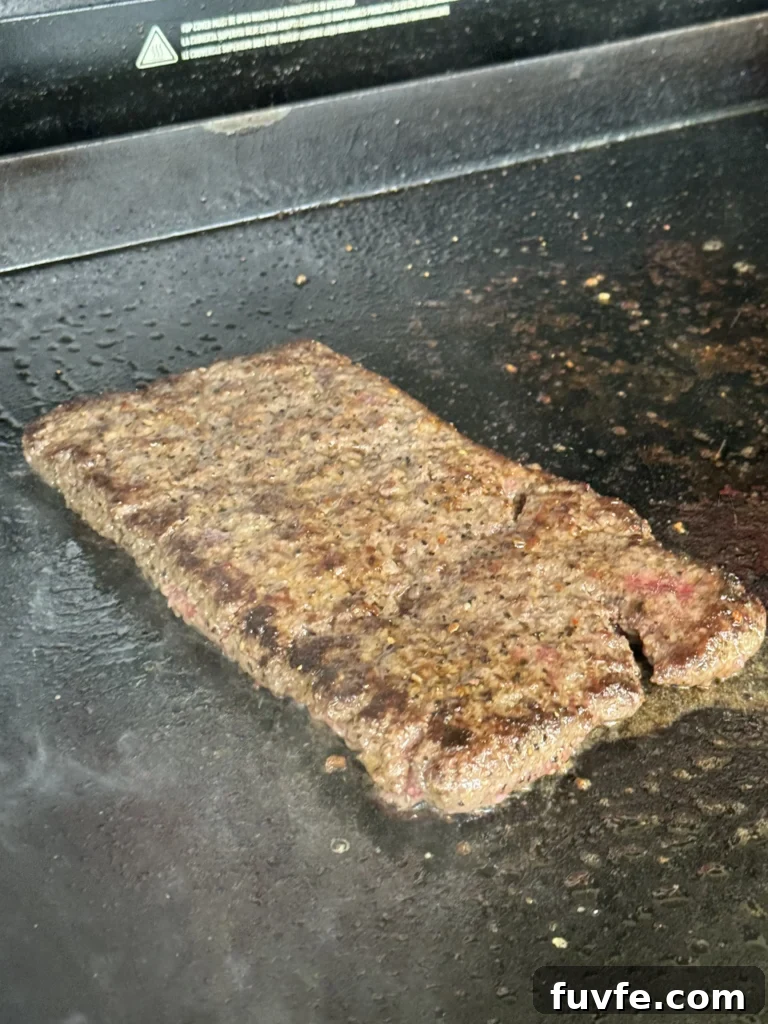 Bacon Jam Cheeseburger Sliders Recipe for Party Appetizers 6 cooking the patty on the griddle