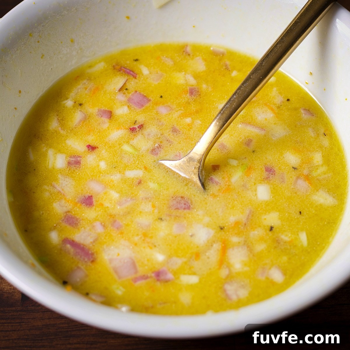 A bowl of creamy honey dijon vinaigrette