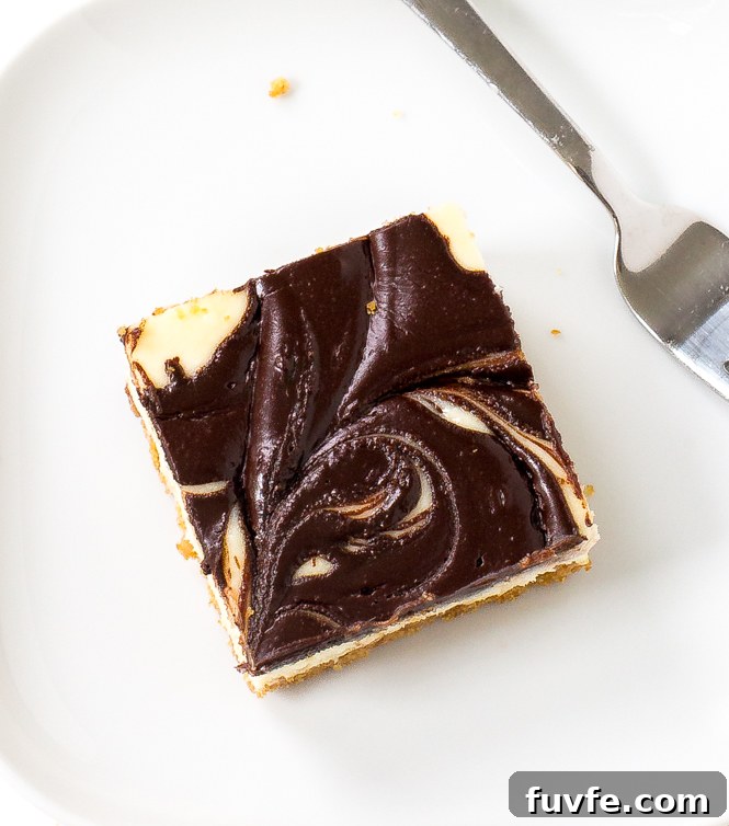 Nutella Swirl Cheesecake Bars with Chocolate Crust 2 Nutella Swirled Cheesecake Bars