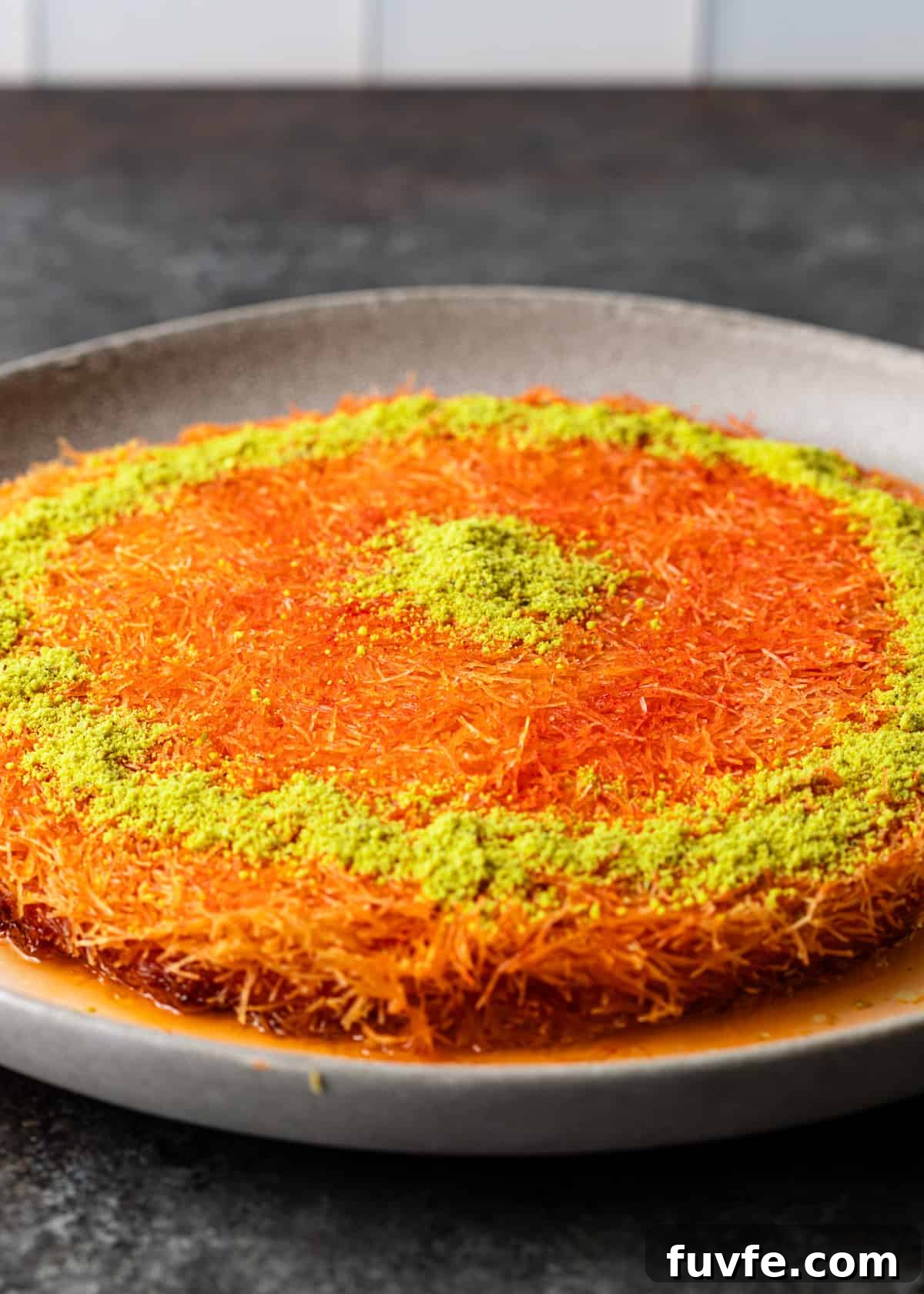 knafeh with chopped pistachios on top