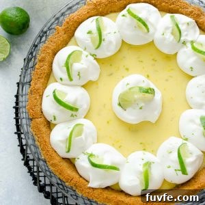 Authentic Key Lime Pie Recipe with Creamy Filling 8 Key lime pie with whipped cream and lime slices