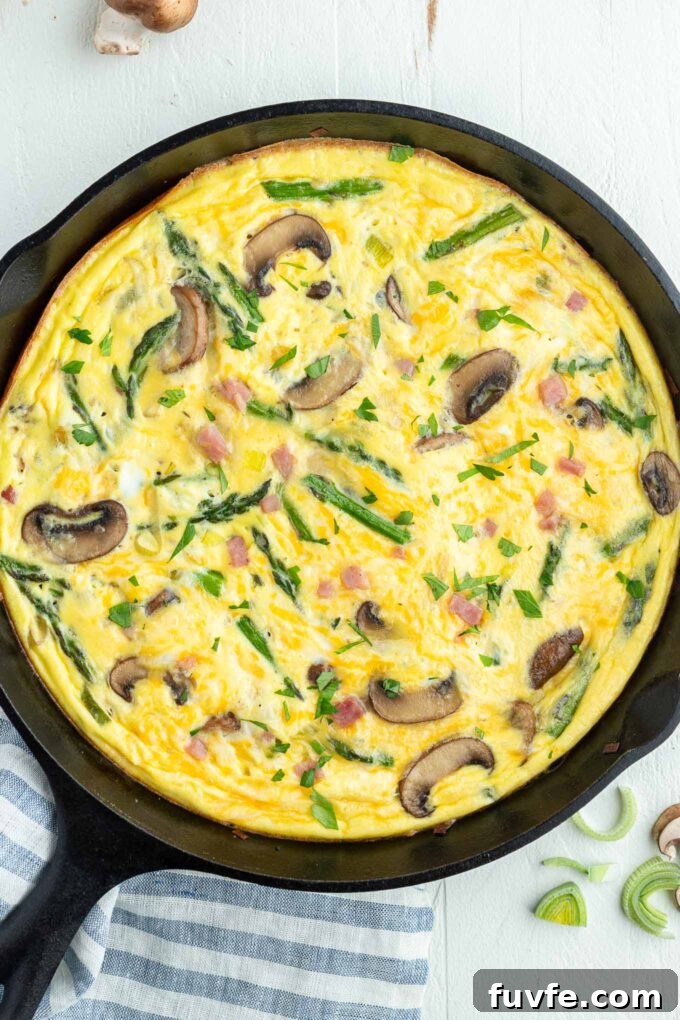 Savory Ham and Cheese Frittata for Brunch 2 Ham and cheese frittata in a skillet