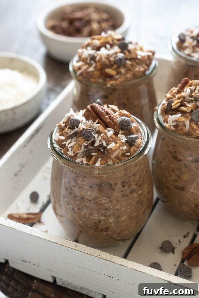 Creamy German Chocolate Overnight Oats Recipe 2 German chocolate overnight oats in jars.