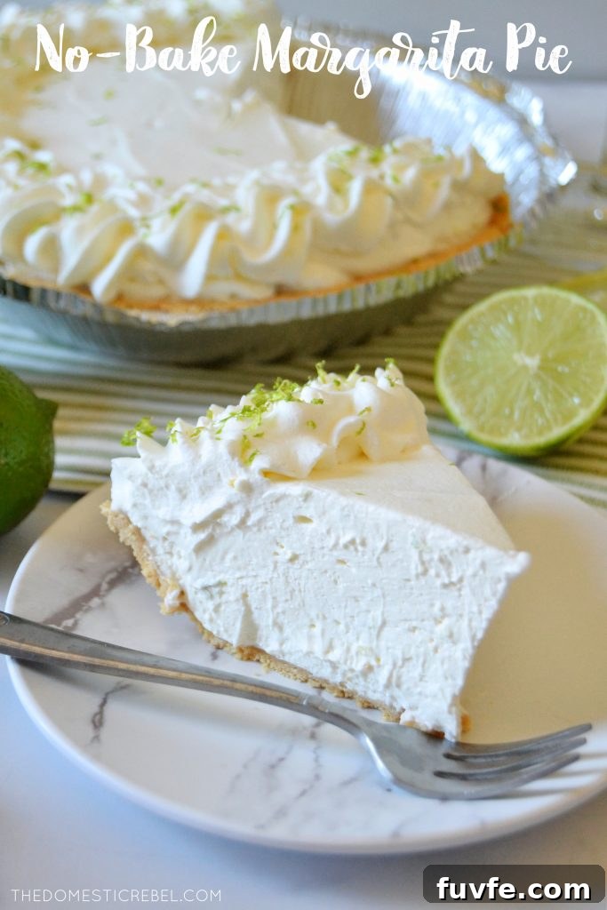 No-Bake Margarita Pie Recipe: Creamy Lime Cocktail Dessert 2 a slice of margarita no bake pie on a white plate with a silver fork and limes