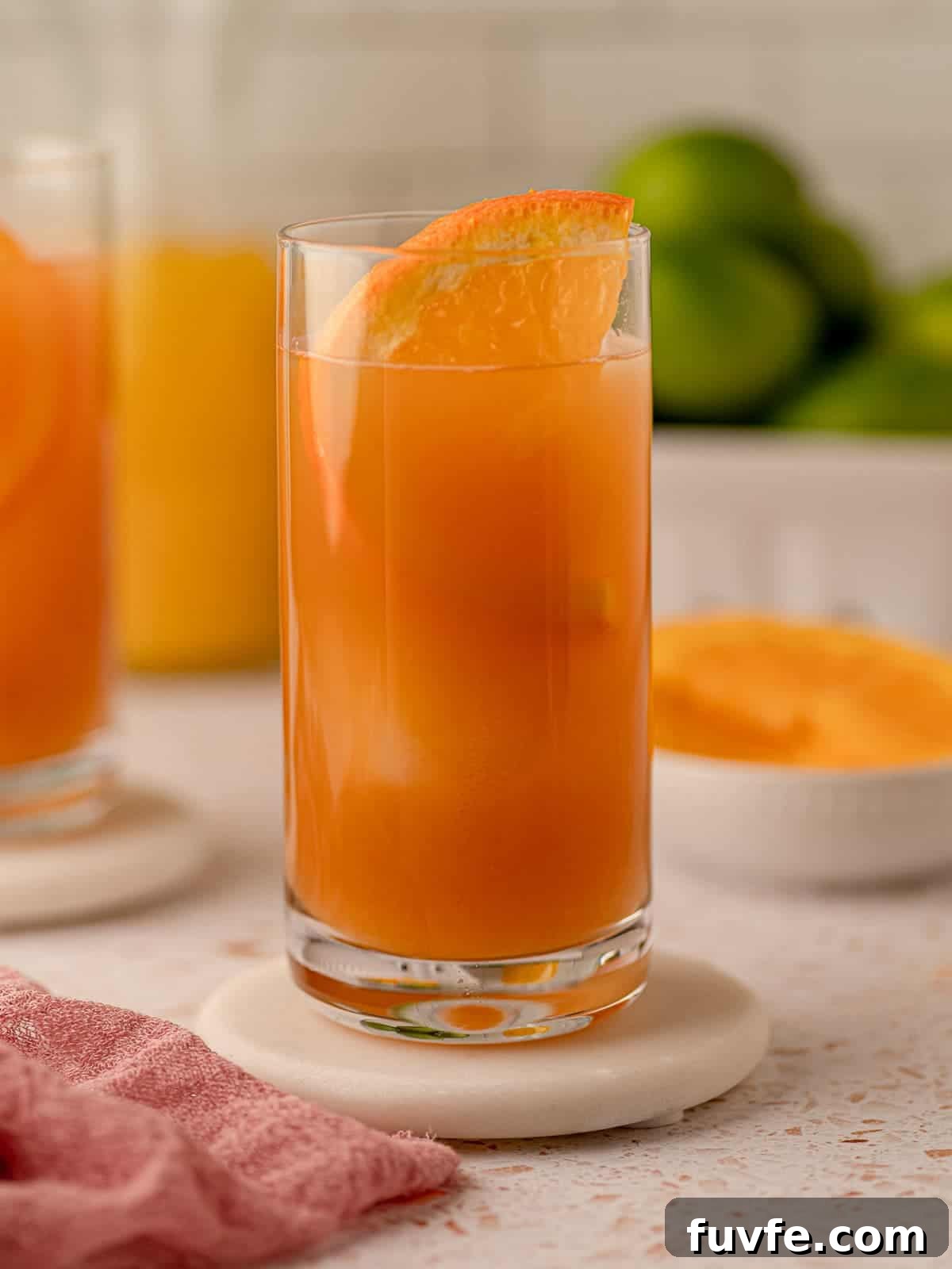 Authentic Jamaican Rum Punch Recipe for Tropical Cocktails 2 Rum punch in a highball glass.
