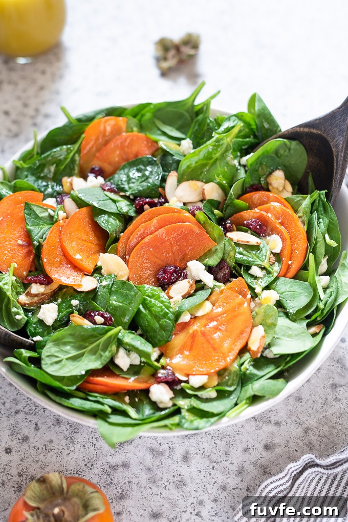 Close up of persimmon salad in a bowl