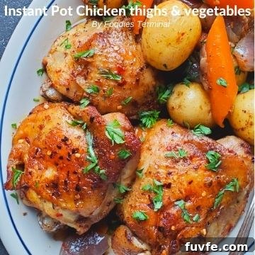 Instant Pot Chicken Thighs with Fluffy White Rice 11 pressure cooked skin on chicken thighs, baby potatoes, carrots in a white plate garnished with chopped parsley