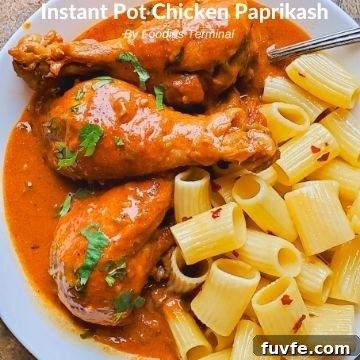 Instant Pot Chicken Thighs with Fluffy White Rice 12 chicken paprikash with drumsticks served on a white plate with buttered pasta on the side