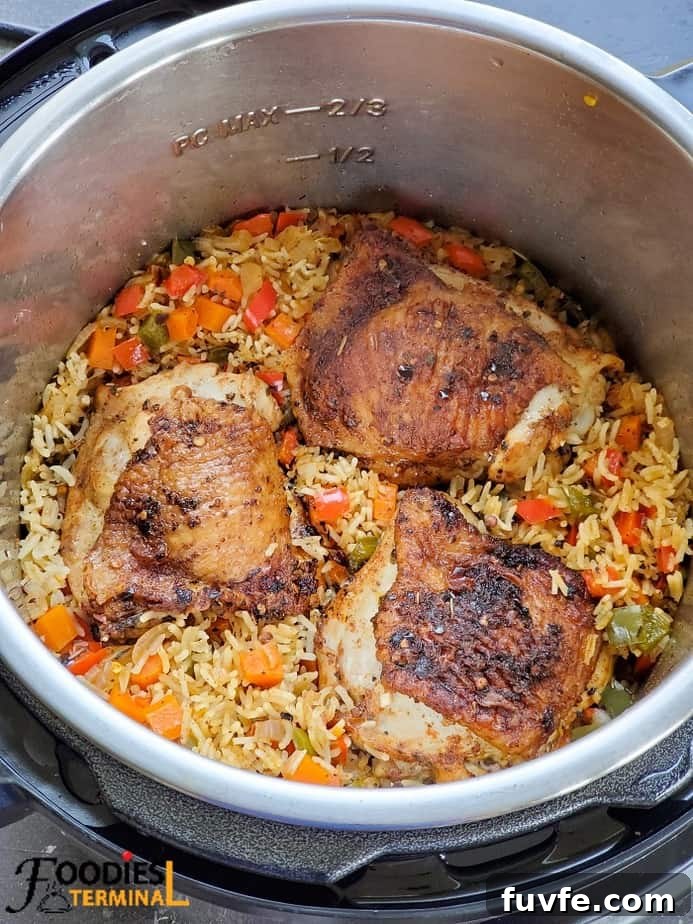 Instant Pot Chicken Thighs with Fluffy White Rice 3 bone in skin on chicken thighs and rice in instant pot