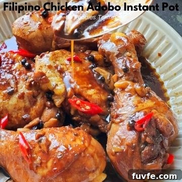 Instant Pot Chicken Thighs with Fluffy White Rice 16 drizzling adobo sauce over instant pot chicken adobo