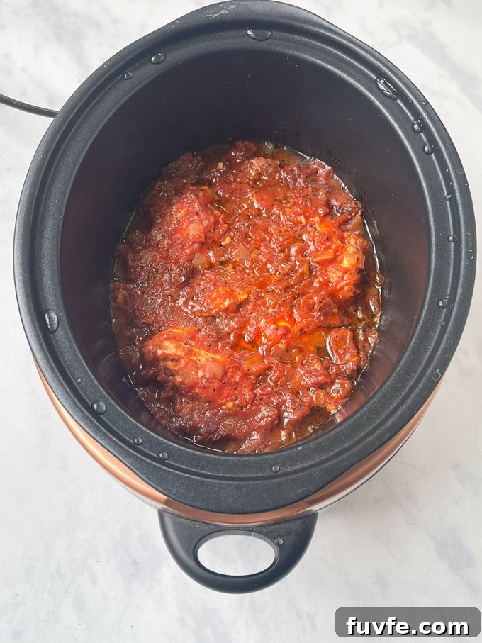Sun-Dried Tomato Chicken and Pasta Made in a Slow Cooker 5 the dish in the slow cooker after being cooked