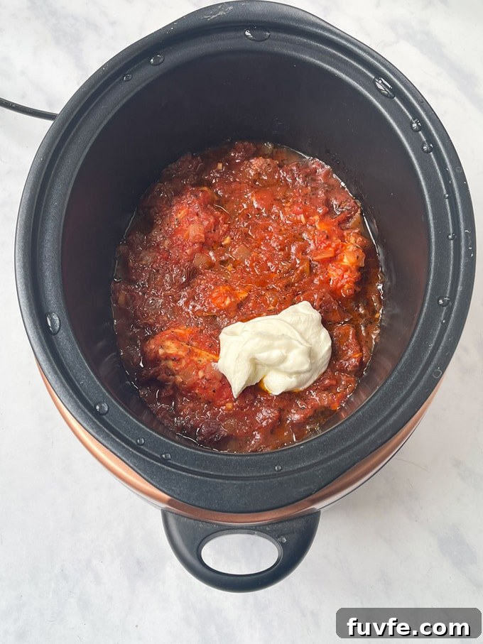 Sun-Dried Tomato Chicken and Pasta Made in a Slow Cooker 6 creme fraiche added to the slow cooker