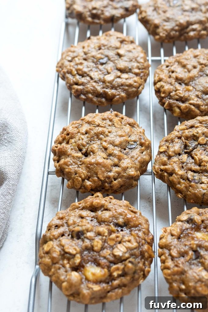 Gluten-Free Peanut Butter Banana Oatmeal Cookies Recipe 6 Peanut butter banana oatmeal cookies cooling on a wire rack