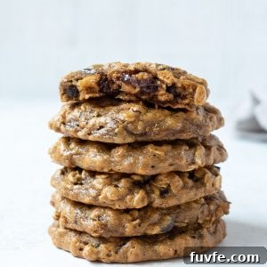 Gluten-Free Peanut Butter Banana Oatmeal Cookies Recipe 8 Stack of peanut butter banana oatmeal cookies with top cookie in half