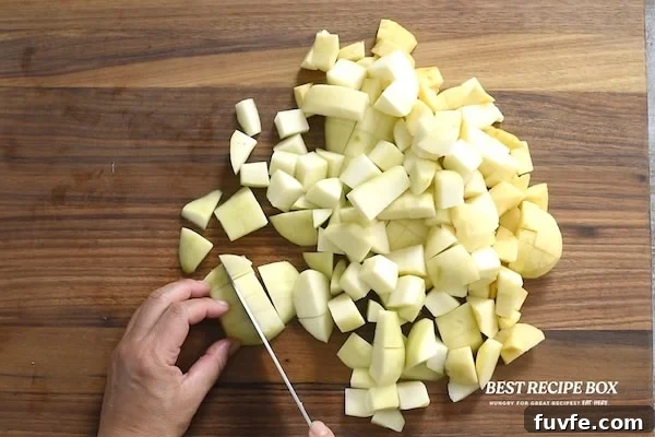 Spiced Pear and Apple Sauce Recipe for Fall 3 Cutting up apples and pears