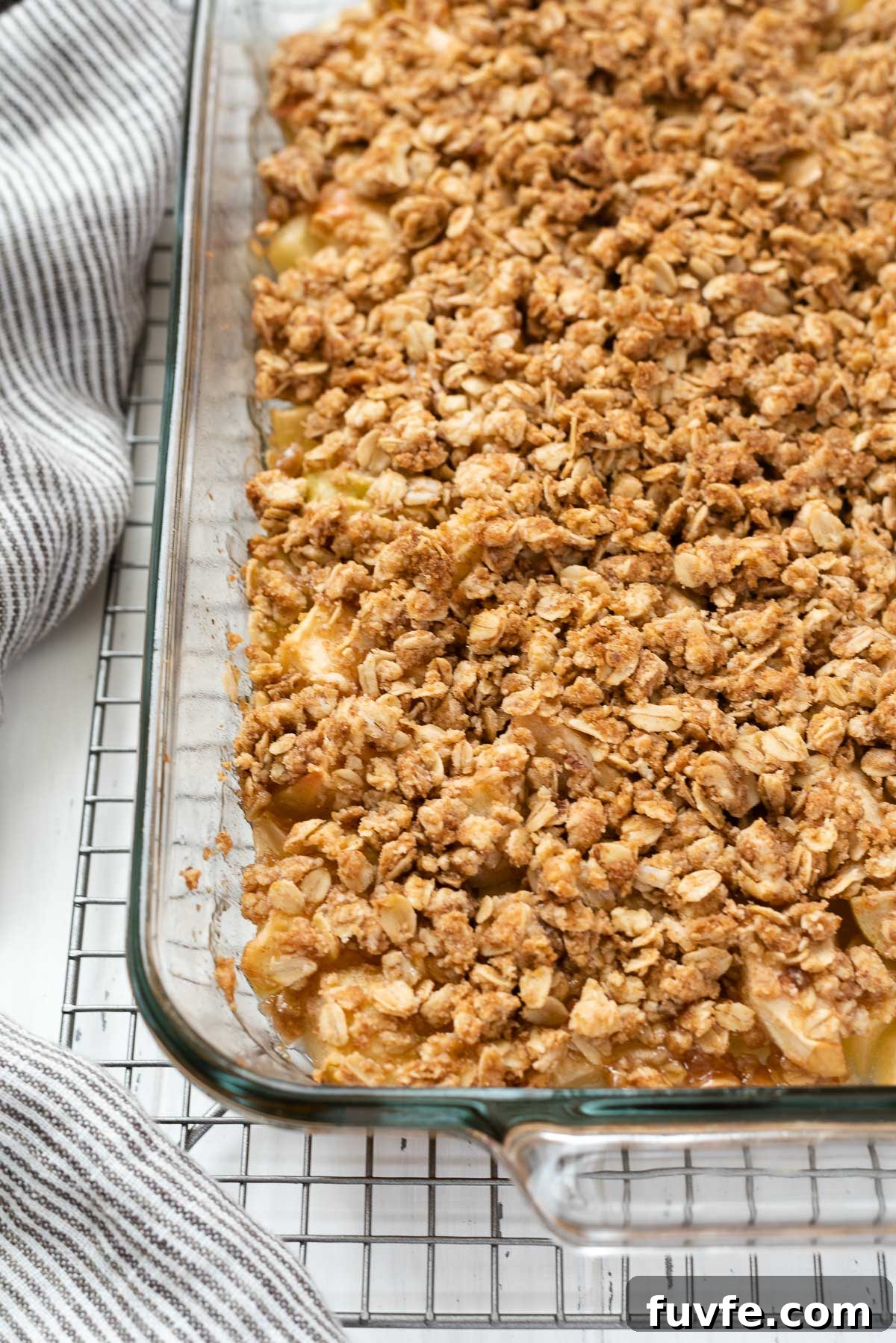 Classic Apple Crisp Recipe with Crunchy Oat Topping 8 Apple crisp recipe in baking dish on wire rack