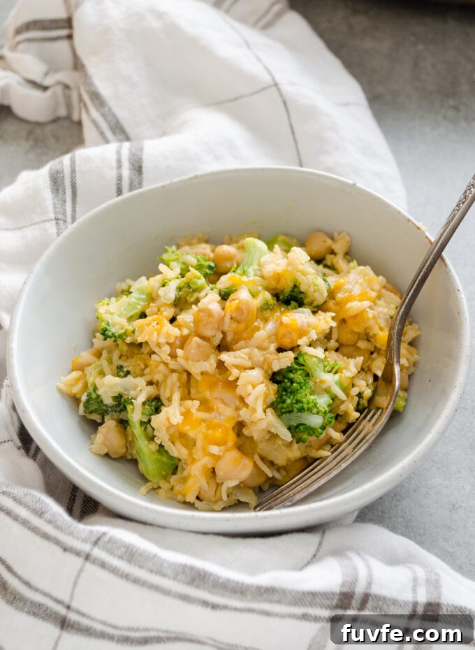 Serving of chickpea broccoli rice casserole in a bowl.