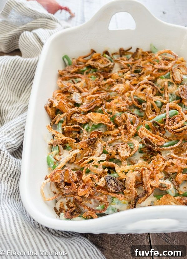 Homemade green bean casserole in white baking dish