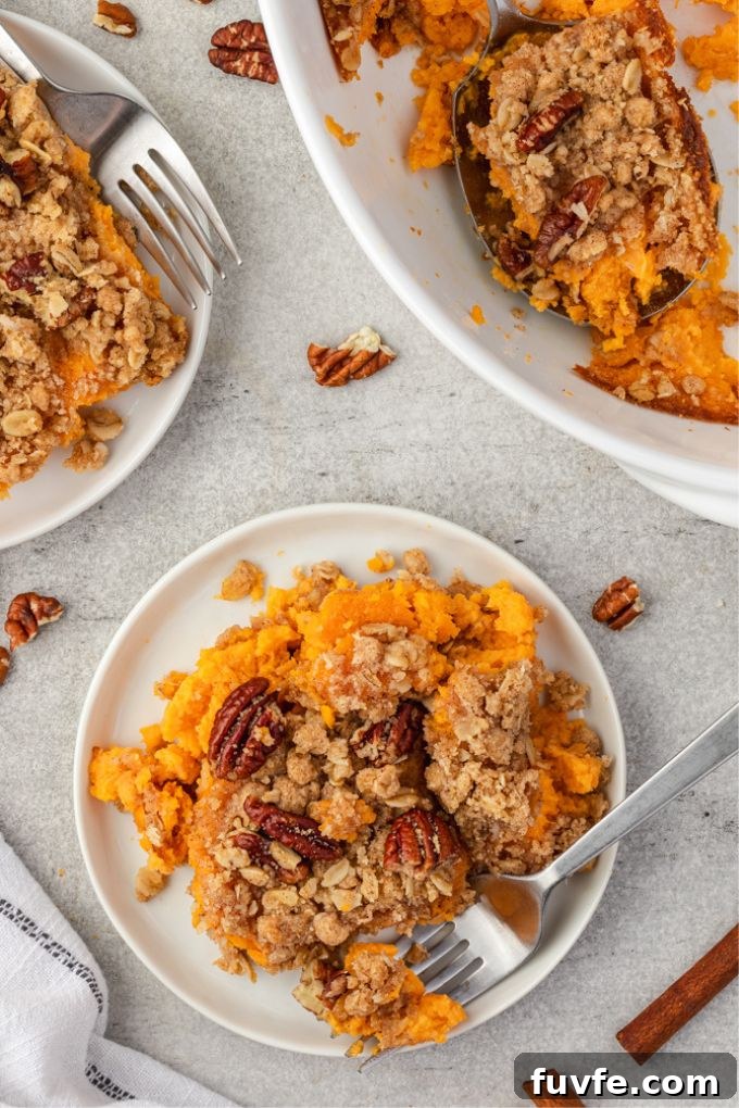 Sweet Potato Casserole with Brown Sugar Streusel 3 Serving of sweet potato casserole on plates